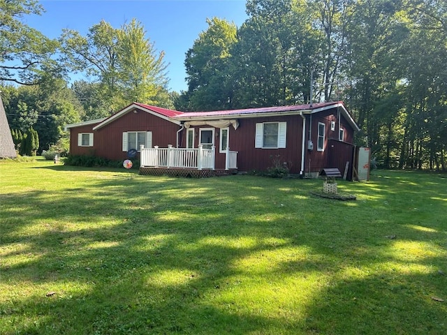 ranch-style house with a front lawn