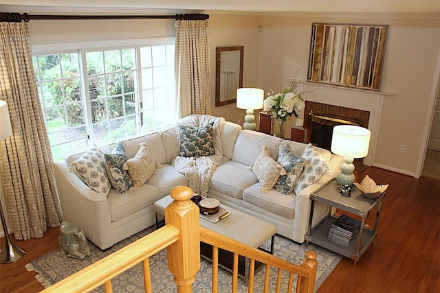 1351 Top Rd, Erie, PA 16505 - living area with wood finished floors, crown molding, and a fireplace