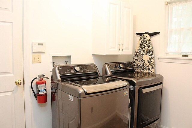 1351 Top Rd, Erie, PA 16505 - laundry room featuring cabinet space and washing machine and clothes dryer