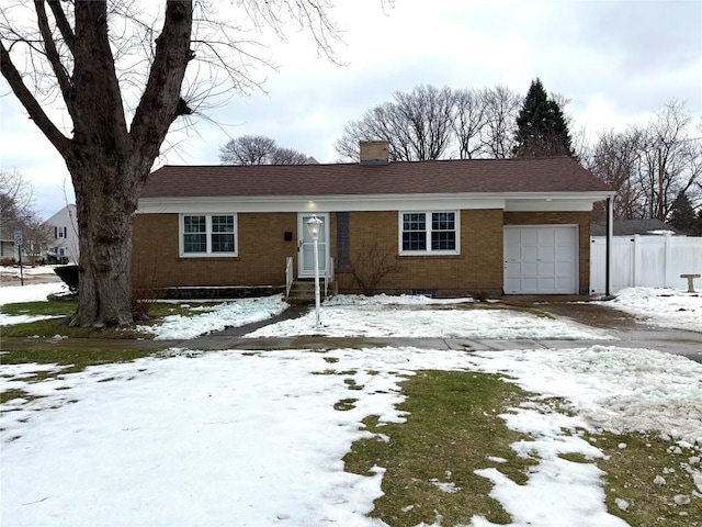 single story home with a garage