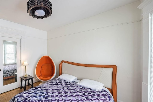 bedroom featuring hardwood / wood-style flooring