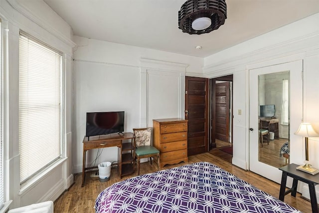 bedroom featuring hardwood / wood-style floors