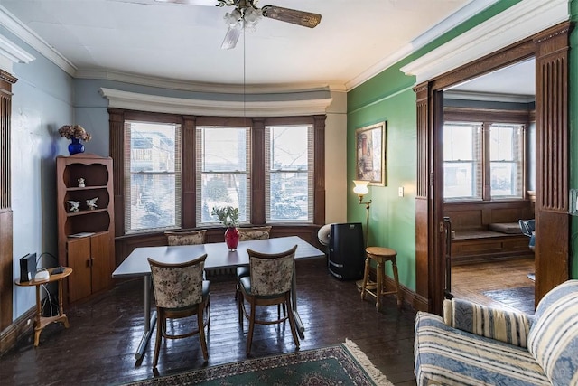 dining area featuring ornamental molding and ceiling fan