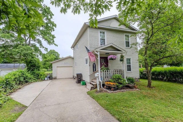 118 Chestnut St, Edinboro, PA 16412 - view of front of house with a front yard, driveway, and a garage