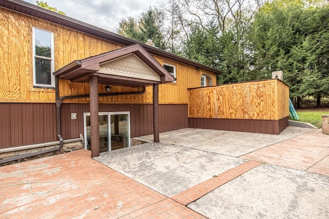 back of property with a patio area