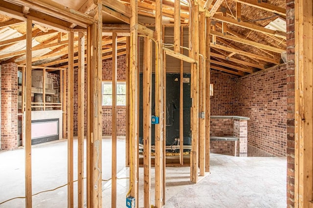 miscellaneous room featuring brick wall