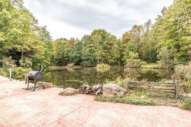 view of patio / terrace featuring a water view