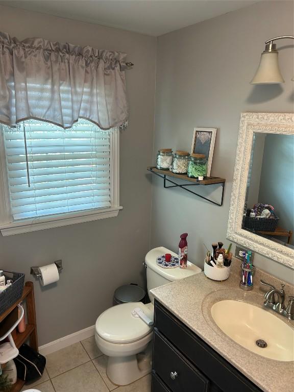 103 S Church St, Linesville, PA 16424 - bathroom with vanity and tile patterned floors