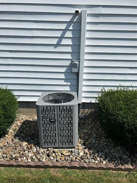 103 S Church St, Linesville, PA 16424 - exterior view of a central air condition unit