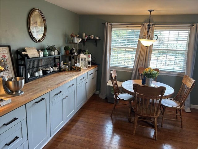 103 S Church St, Linesville, PA 16424 - dining room with dark wood finished floors and plenty of natural light