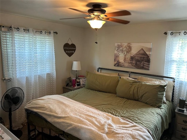 103 S Church St, Linesville, PA 16424 - bedroom featuring multiple windows and a ceiling fan