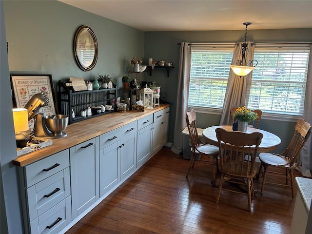 103 S Church St, Linesville, PA 16424 - dining area featuring dark wood-type flooring