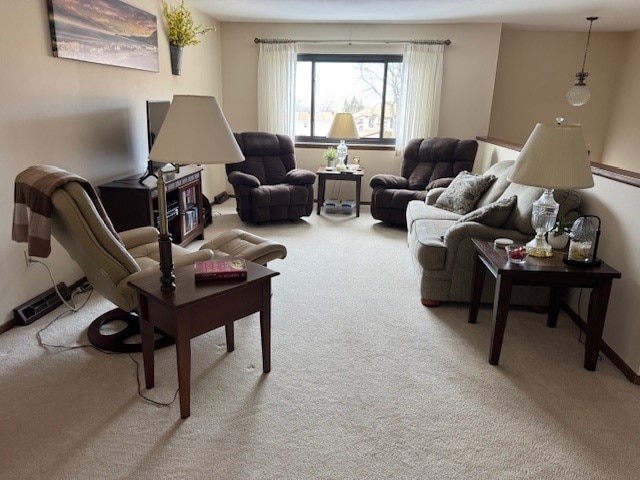 living area featuring light colored carpet