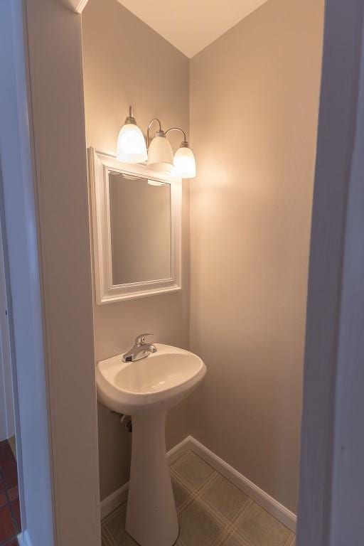 bathroom featuring baseboards