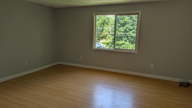 239 Marion St, Corry, PA 16407 - empty room featuring wood finished floors and baseboards