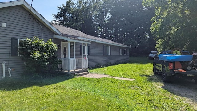 239 Marion St, Corry, PA 16407 - view of home's exterior with a yard