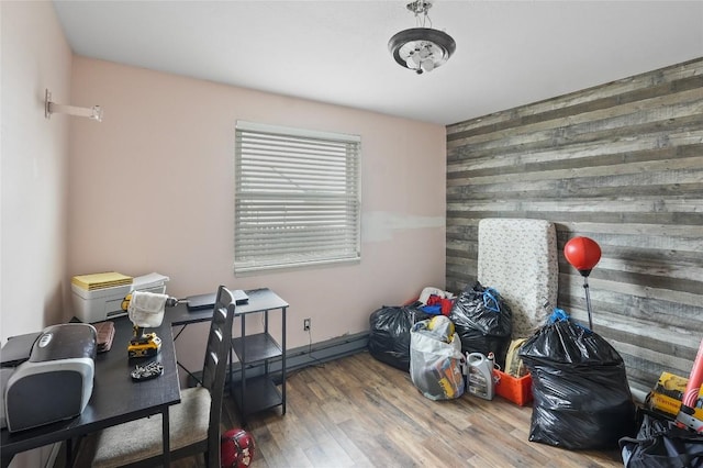 misc room featuring hardwood / wood-style floors and wooden walls