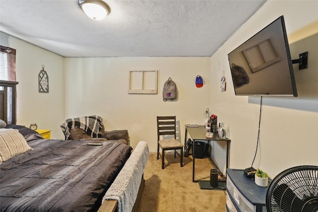 carpeted bedroom featuring a textured ceiling