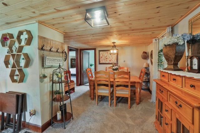 dining space featuring wooden ceiling and light colored carpet