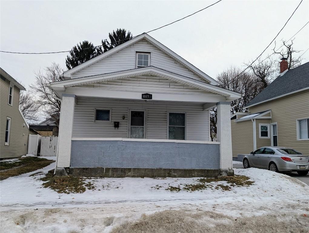 bungalow-style home with a porch