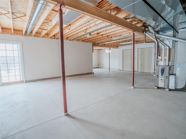 basement featuring heating unit