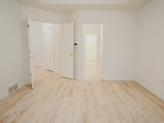 empty room featuring light hardwood / wood-style floors