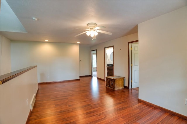 13151 Water Ext, Edinboro, PA 16412 - spare room featuring dark wood-style flooring, a ceiling fan, recessed lighting, and a smoke detector