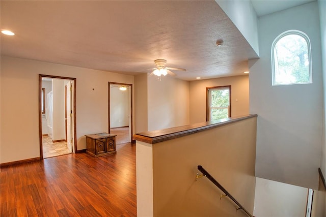 13151 Water Ext, Edinboro, PA 16412 - empty room with wood finished floors, ceiling fan, and recessed lighting