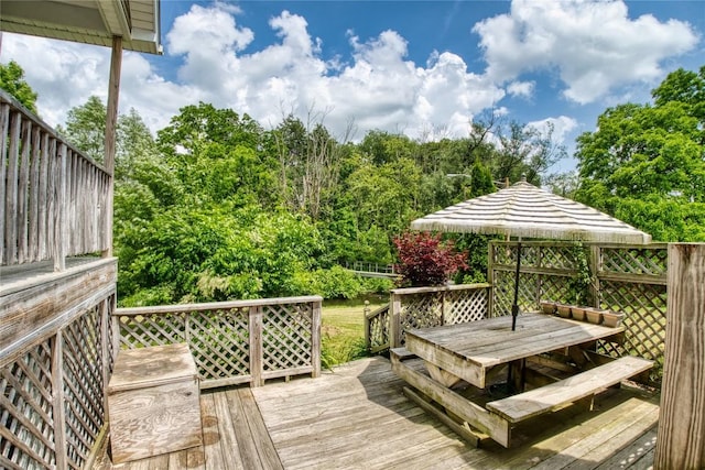 13151 Water Ext, Edinboro, PA 16412 - wooden terrace with outdoor dining area and view of scattered trees