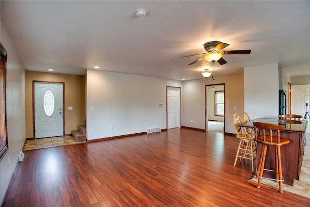 13151 Water Ext, Edinboro, PA 16412 - living room featuring ceiling fan, wood finished floors, stairway, and recessed lighting