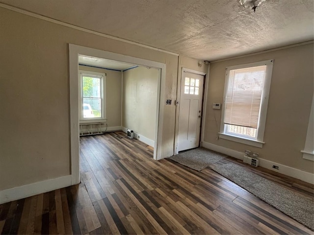 2022 Cottage St, Erie, PA 16503 - foyer with dark wood-style floors, baseboards, and a textured ceiling