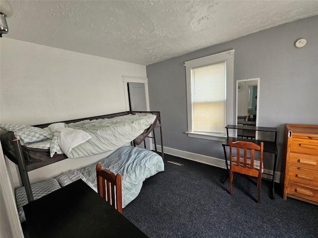 520 E 2nd St, Erie, PA 16507 - bedroom with a textured ceiling and carpet flooring