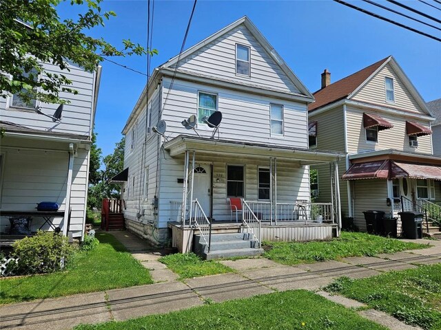 520 E 2nd St, Erie, PA 16507 - view of front facade featuring covered porch