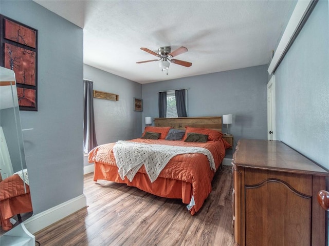 817 E Main St, Corry, PA 16407 - bedroom featuring wood finished floors, baseboards, and a ceiling fan