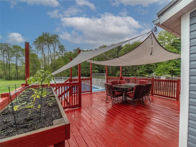 817 E Main St, Corry, PA 16407 - wooden deck featuring outdoor dining area and a fenced backyard