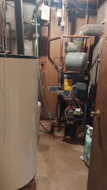 utility room with water heater