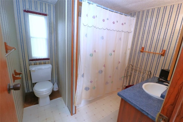 22080 Merganser Ln, Cochranton, PA 16314 - full bathroom featuring wallpapered walls, tile patterned floors, toilet, vanity, and a textured ceiling