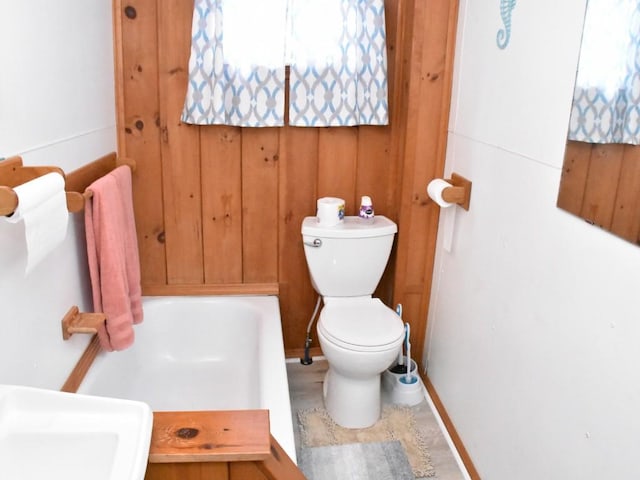 bathroom featuring toilet and sink