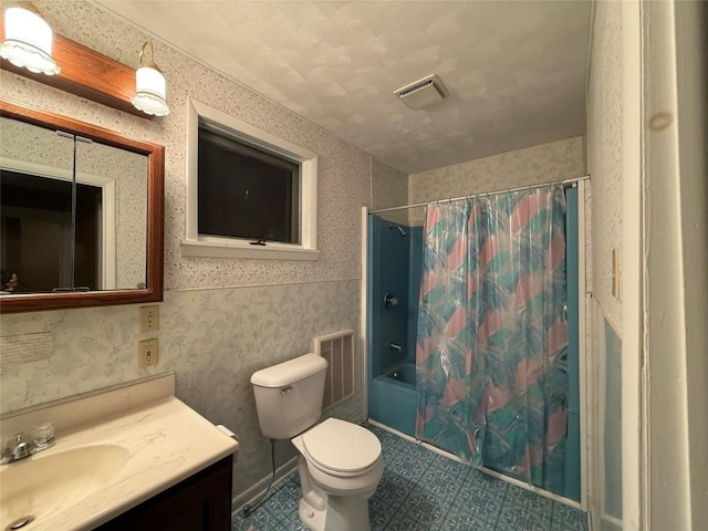 bathroom with shower / bath combination with curtain, visible vents, toilet, vanity, and wallpapered walls