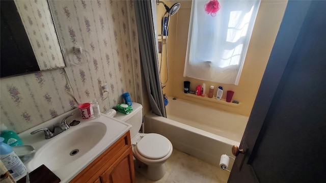 full bathroom featuring shower / tub combo with curtain, vanity, and toilet