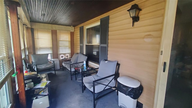 sunroom with wood ceiling