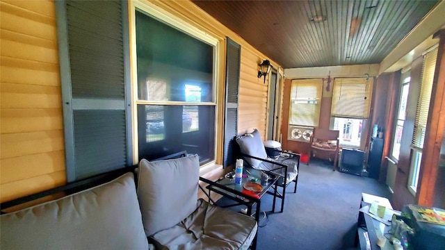 sunroom / solarium with wooden ceiling