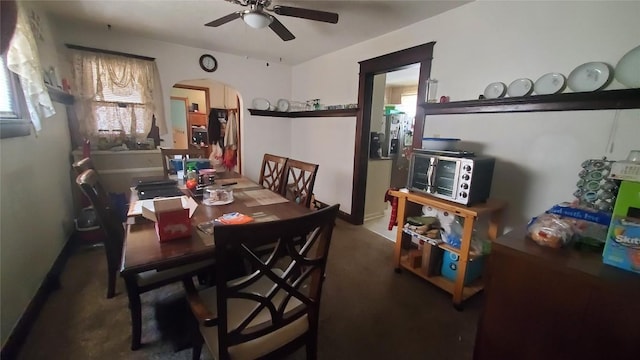 dining space with ceiling fan