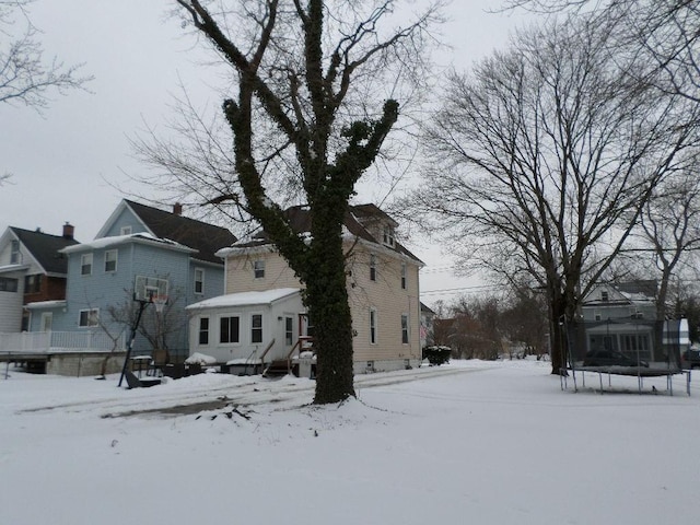 view of front of property with a trampoline