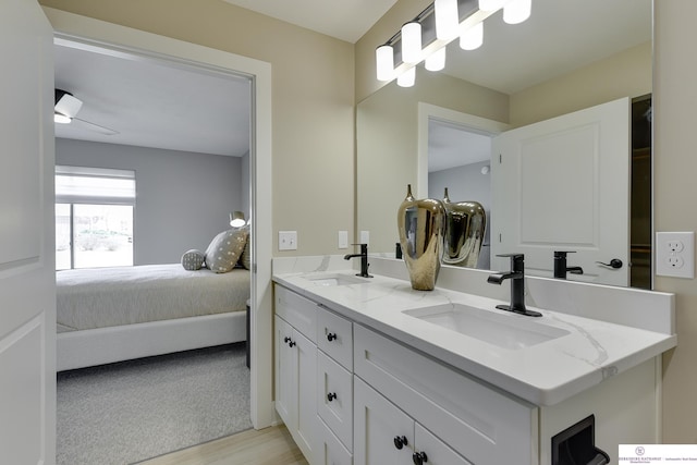 bathroom featuring double vanity
