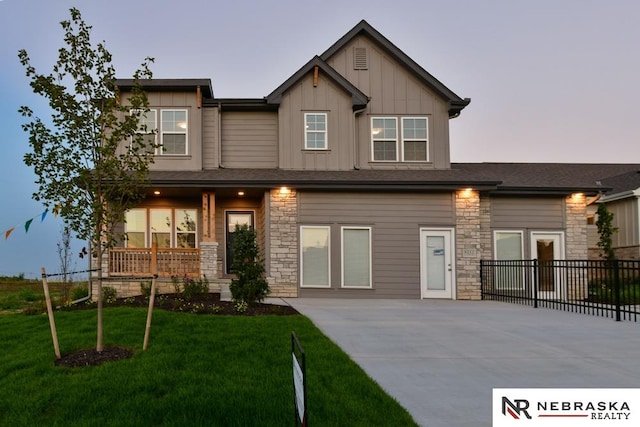 craftsman-style house featuring a yard