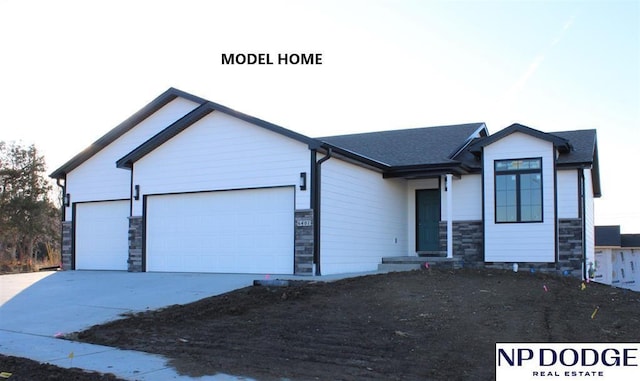 view of front of property featuring a garage