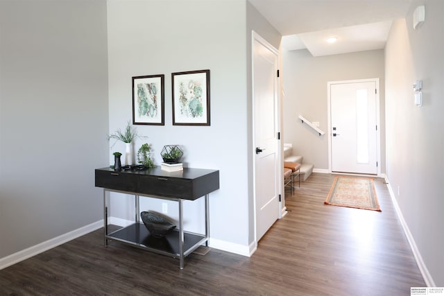 corridor featuring dark wood-type flooring