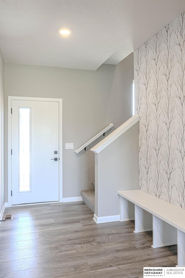 foyer with hardwood / wood-style floors