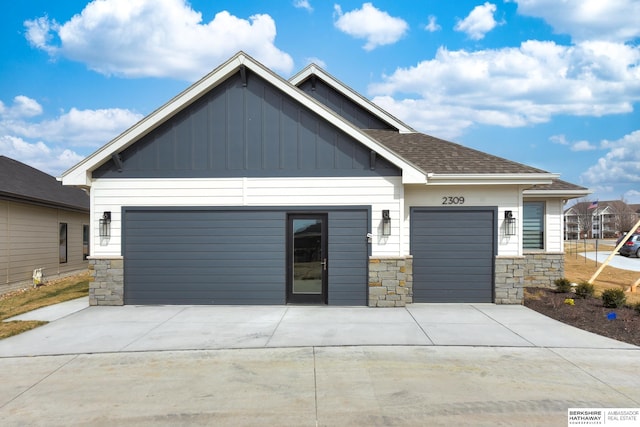 craftsman-style home with a garage